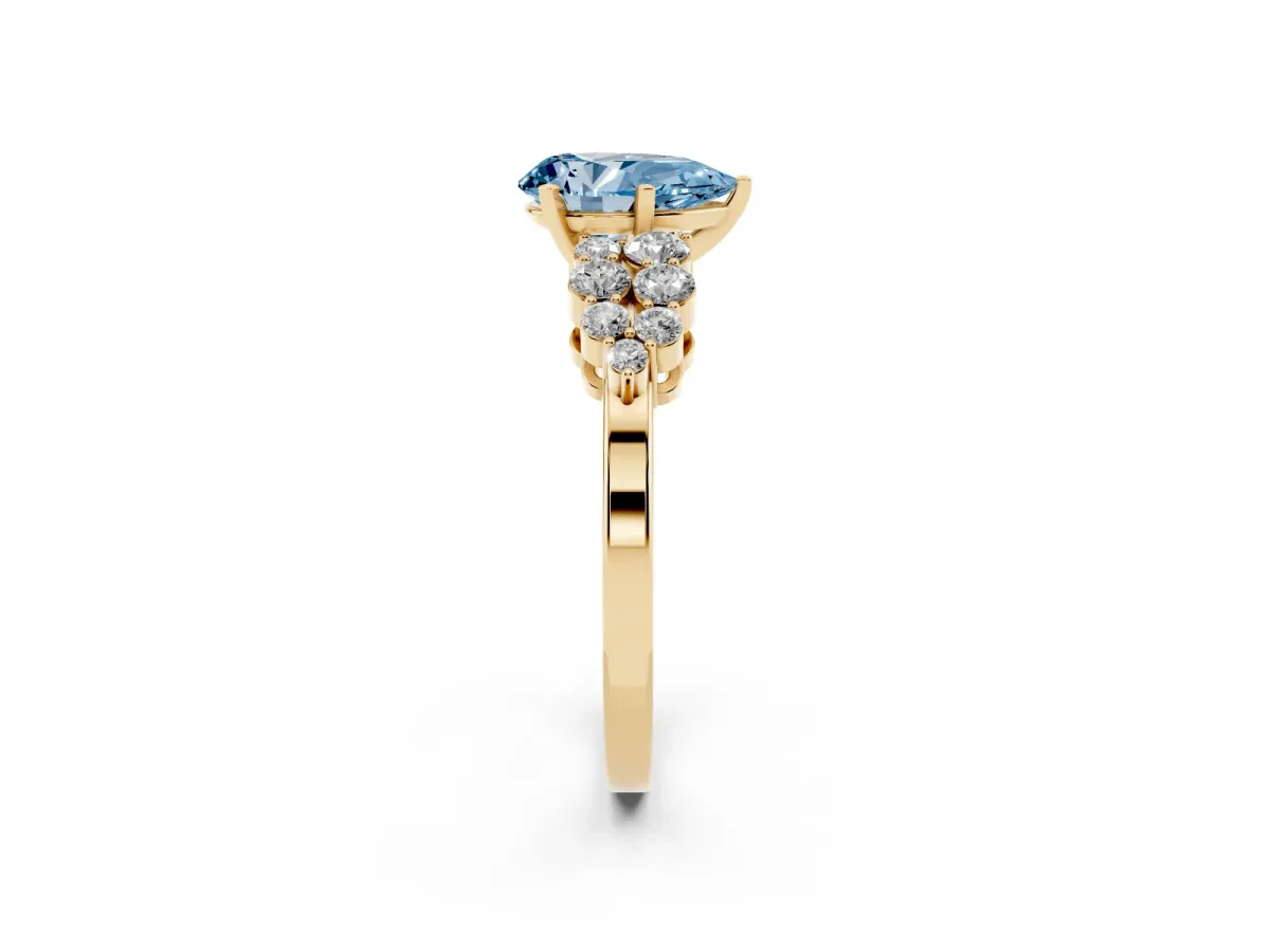 Fancy Blue Pear Cut Cluster Diamond Engagement Ring with Pavé Band and Four-Prong Setting Yellow gold