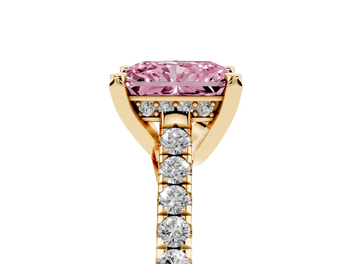 Fancy Pink Radiant Cut Brilliant Diamond Solitaire with Pavé Band and Four-Prong Setting Yellow gold
