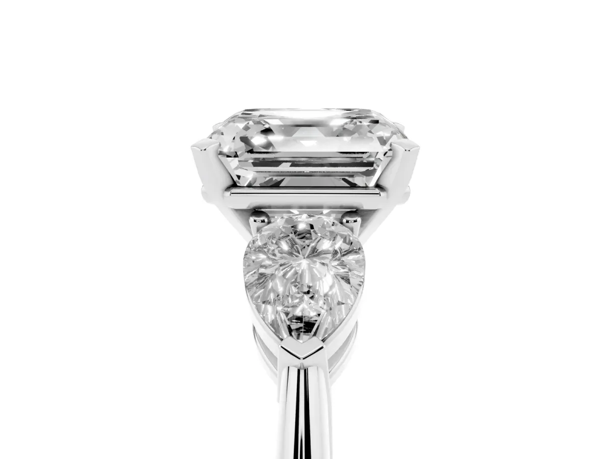 Three-Stone Asscher Cut Diamond Ring with Pear Side Stones and Four-Prong Setting Silver