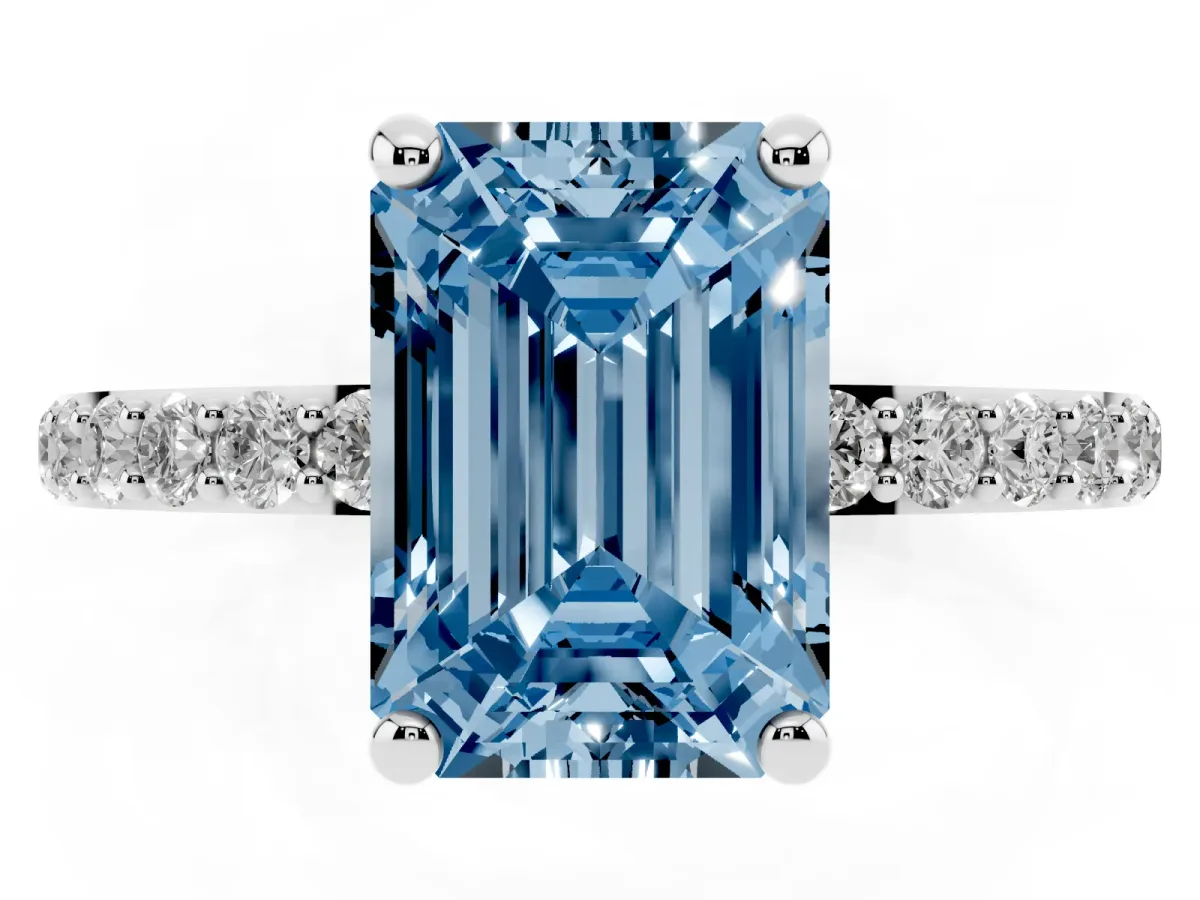 Fancy Blue Emerald Cut Diamond Solitaire Ring with Round Pavé Band and Prong Setting Silver