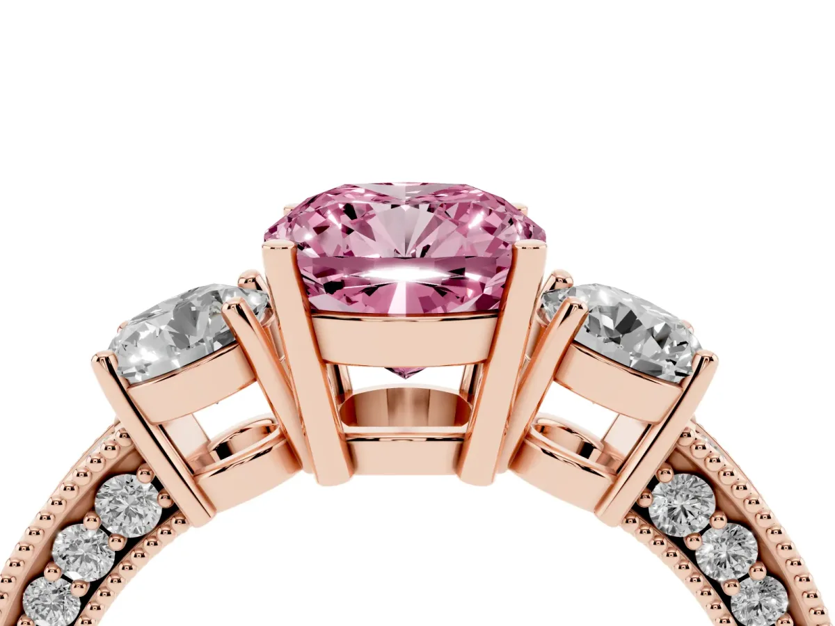 Fancy Pink Cushion Cut Three-Stone Diamond Ring with Pavé Band and Four-Prong Setting Rose gold