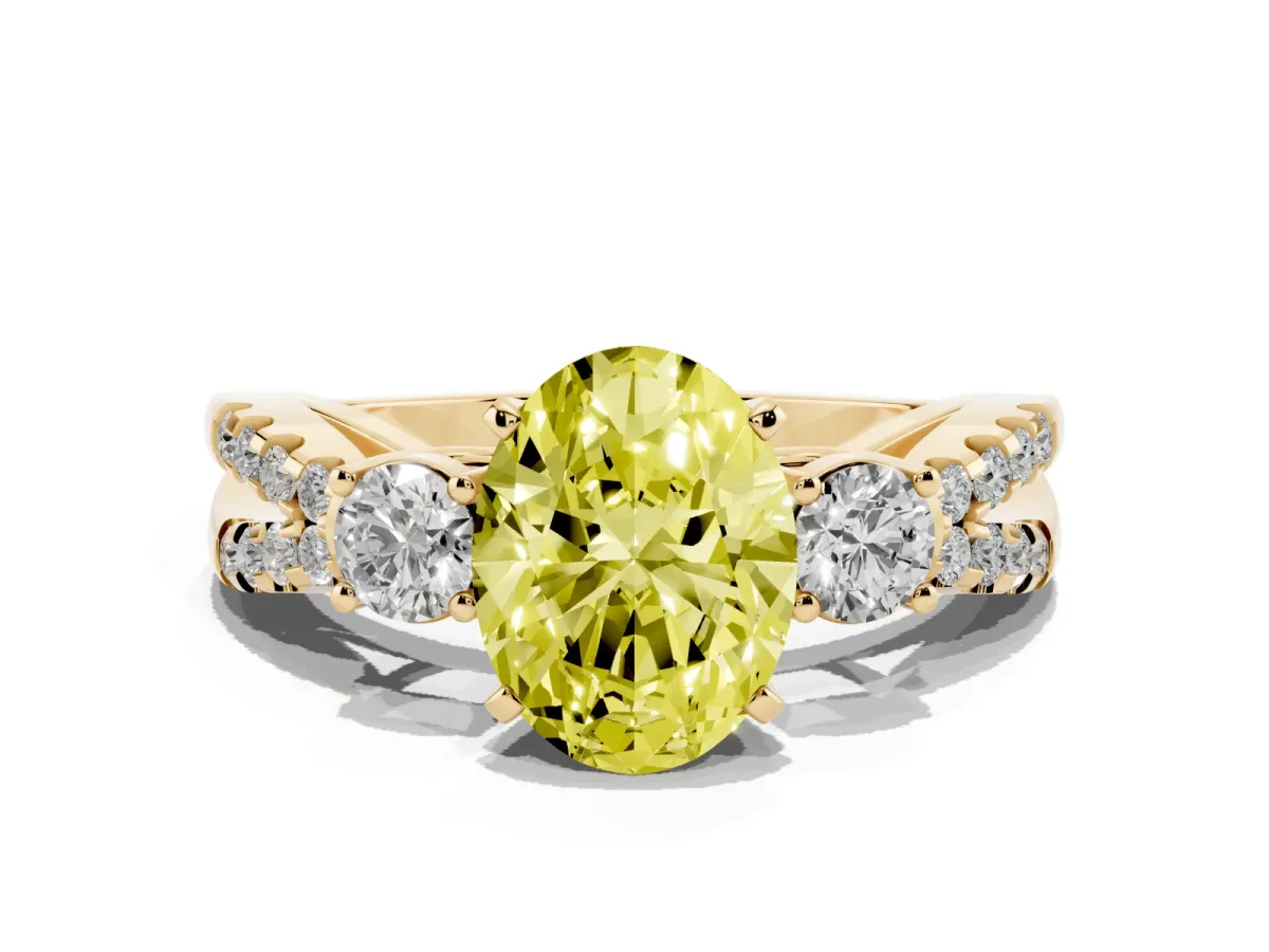 Fancy Yellow Oval Cut Diamond Three-Stone Ring with Pavé Split Shank and Four-Prong Setting Yellow gold