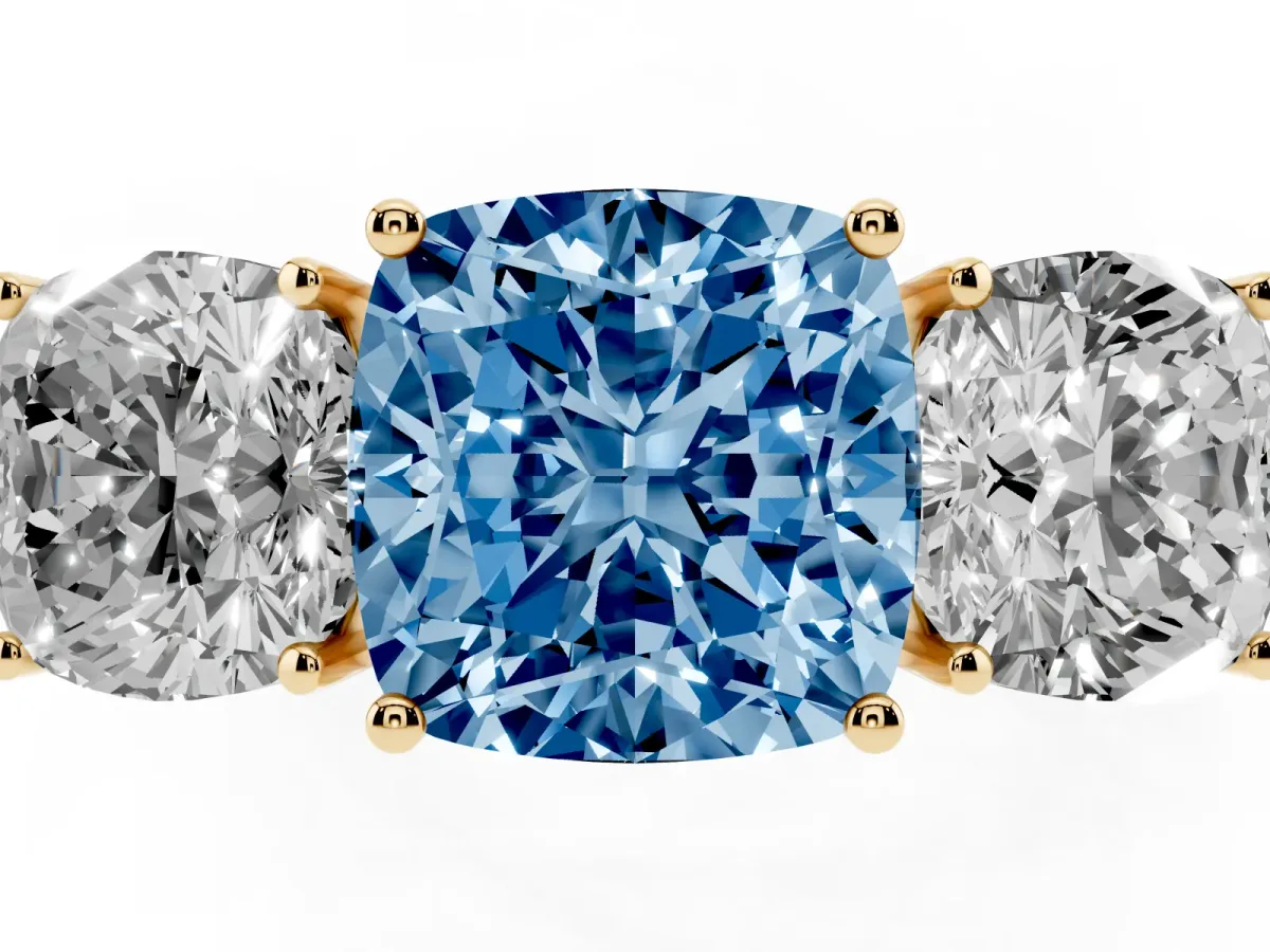 Fancy Blue Cushion Cut Diamond Three-Stone Ring with Prong Setting and Textured Band Yellow gold