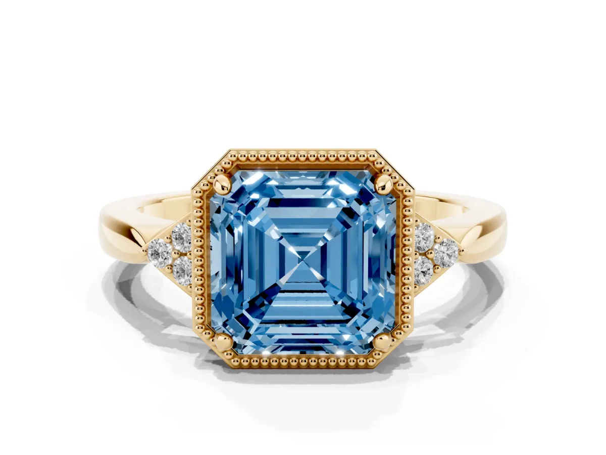 Fancy Blue Asscher Cut Diamond Halo Ring with Tapered Band and Four-Prong Setting Yellow gold