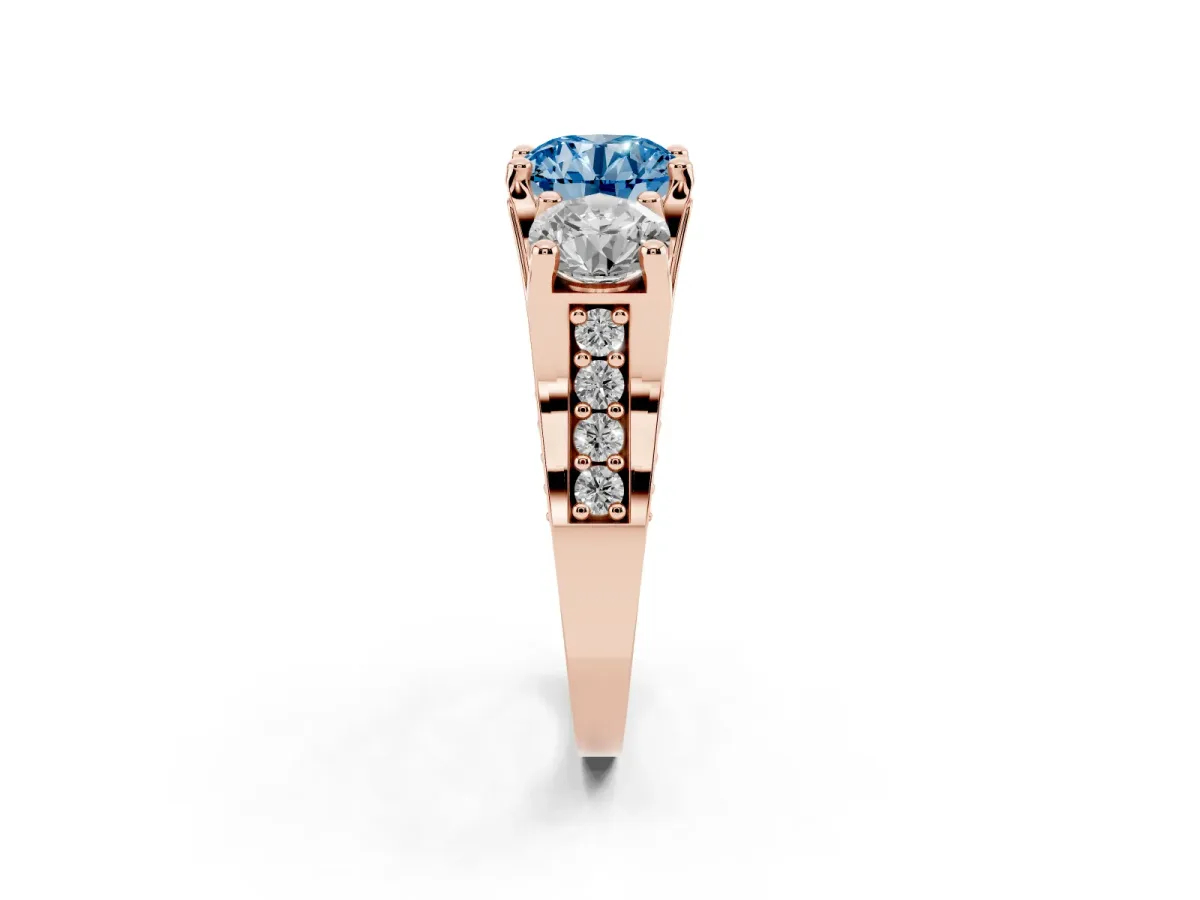 Fancy Blue Round Cut Diamond Three-Stone Ring with Channel Set Band and Four-Prong Setting Rose gold