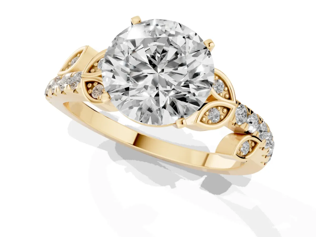 Round Cut Solitaire Leaf-Inspired Diamond Ring with Pavé Band and Four-Prong Setting Yellow gold