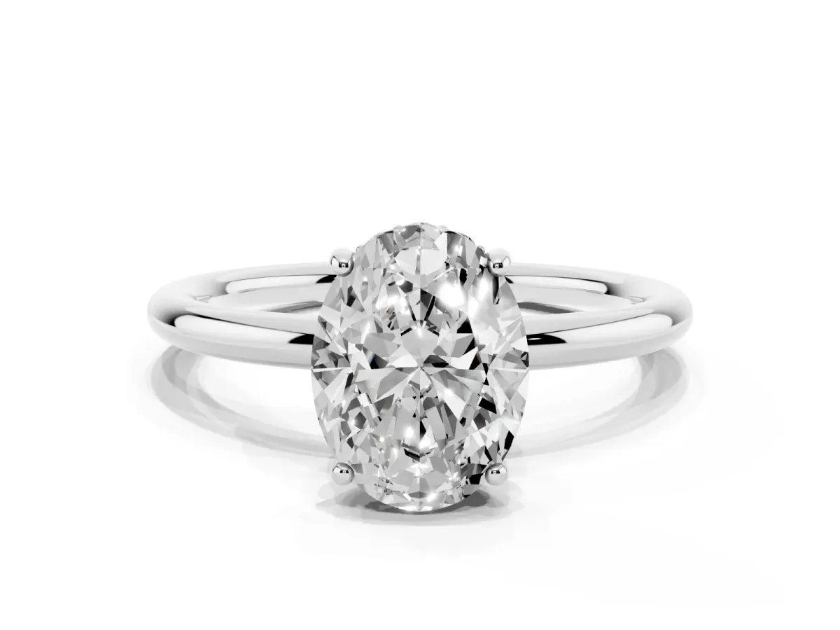 Oval Cut Solitaire Diamond Ring with a Classic Band and Four-Prong Setting Platinum
