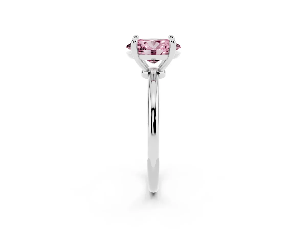 Fancy Pink Oval Cut Solitaire Diamond Ring with 4-Prong Setting on a Classic Band Platinum
