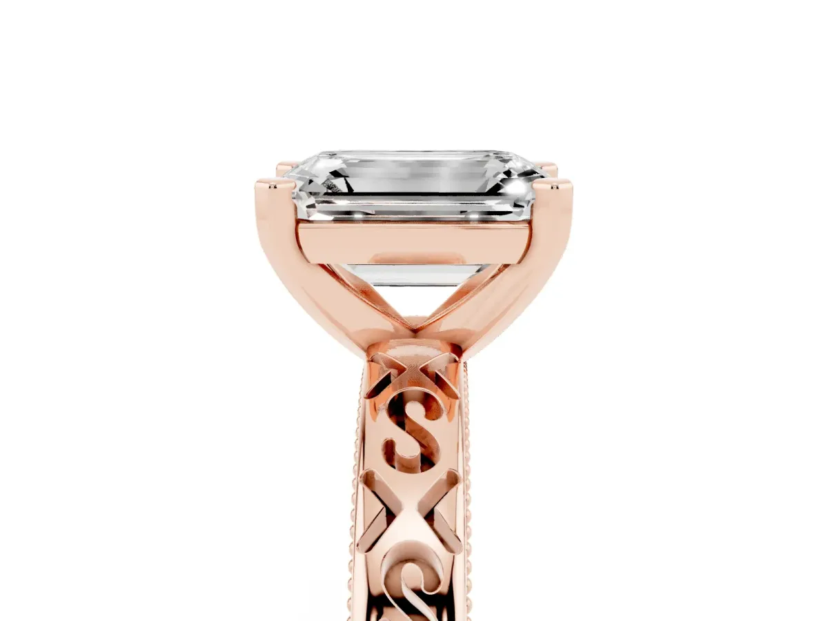 Emerald Cut Solitaire Engagement Ring with Scrollwork Band and Four-Prong Setting Rose gold