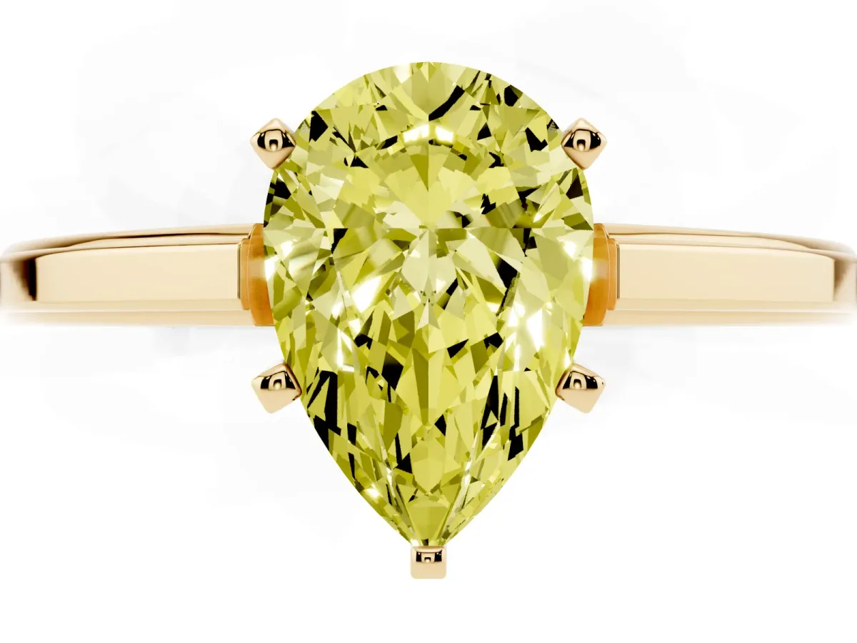 Fancy Yellow Pear Cut Solitaire Diamond Ring with Four-Prong Setting and Classic Band Yellow gold