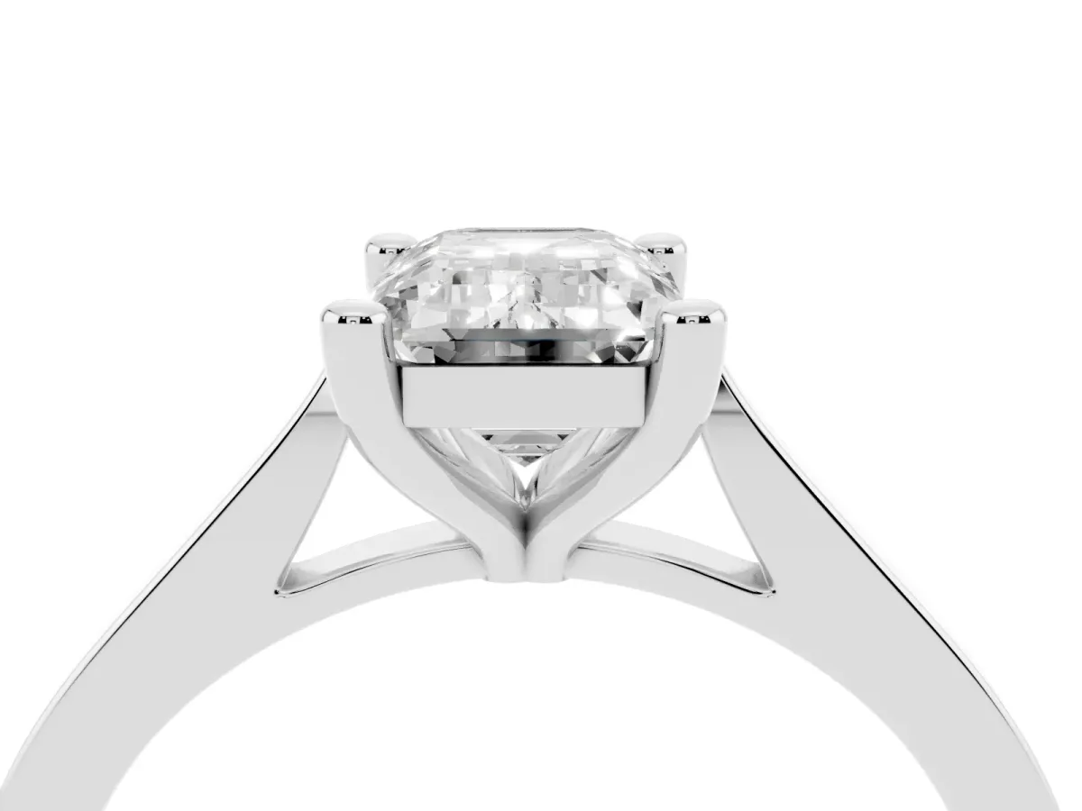 Emerald Cut Solitaire Diamond Ring with Four-Prong Setting and Tapered Band White gold