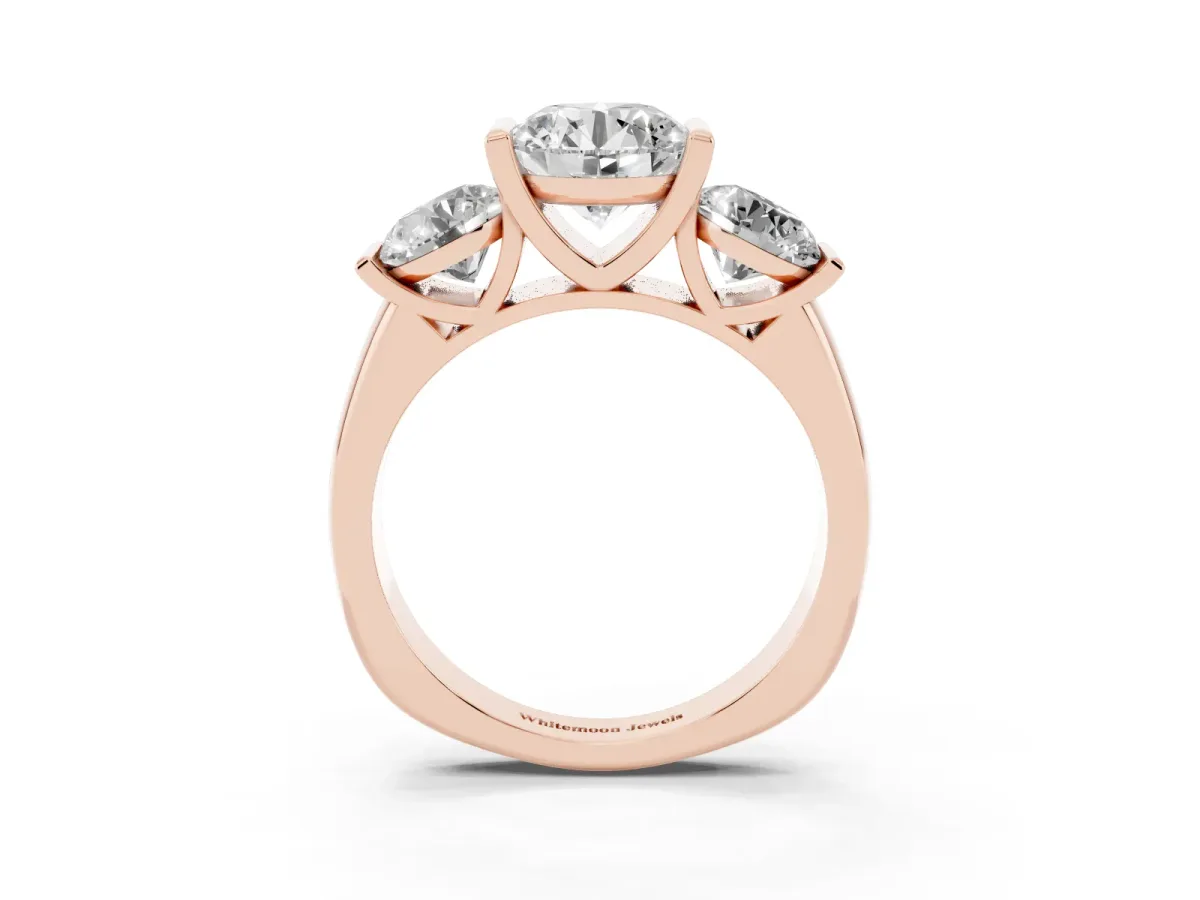 Three-Stone Round Cut Brilliant Diamond Ring with Channel Setting and White Gold Band Rose gold