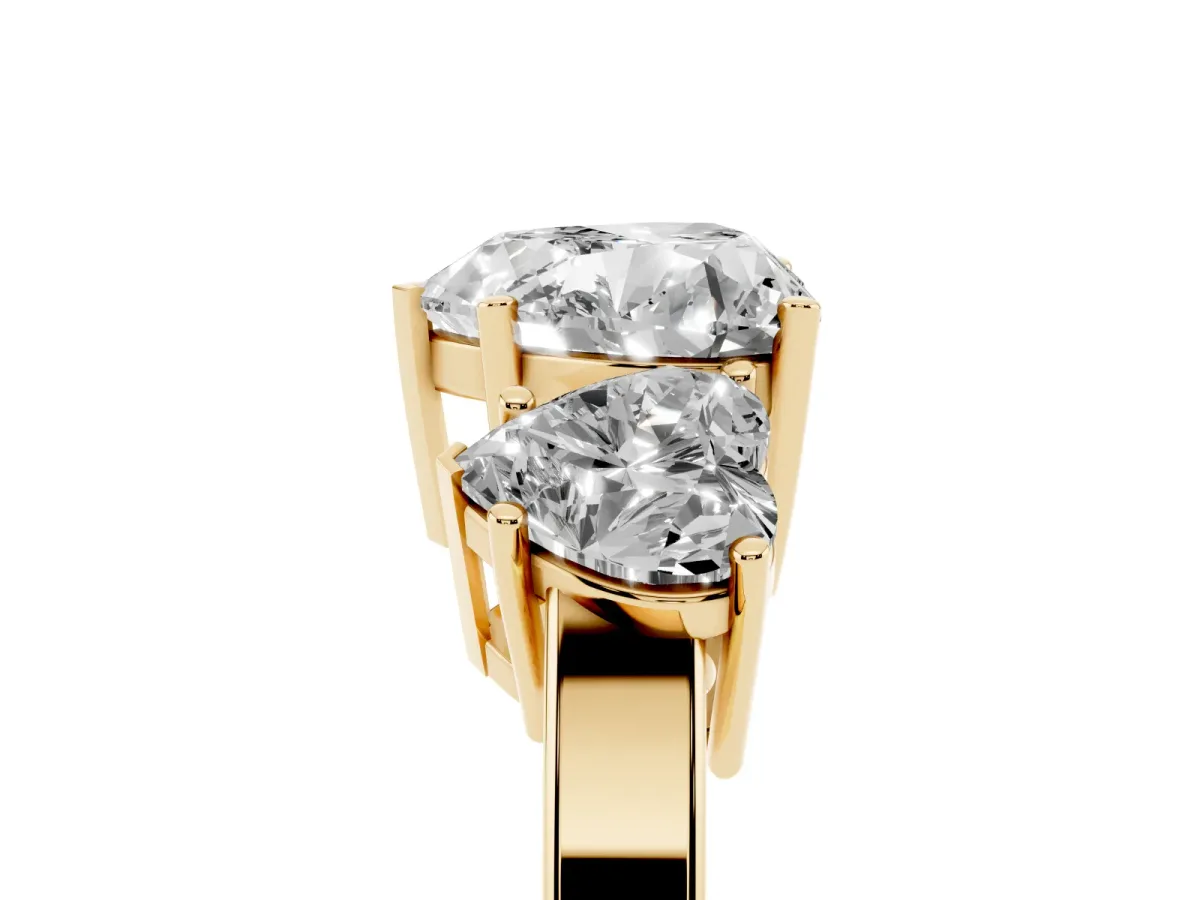Three-Stone Heart Cut Cut Diamond Engagement Ring with Flat Band and Four-Prong Setting Yellow gold