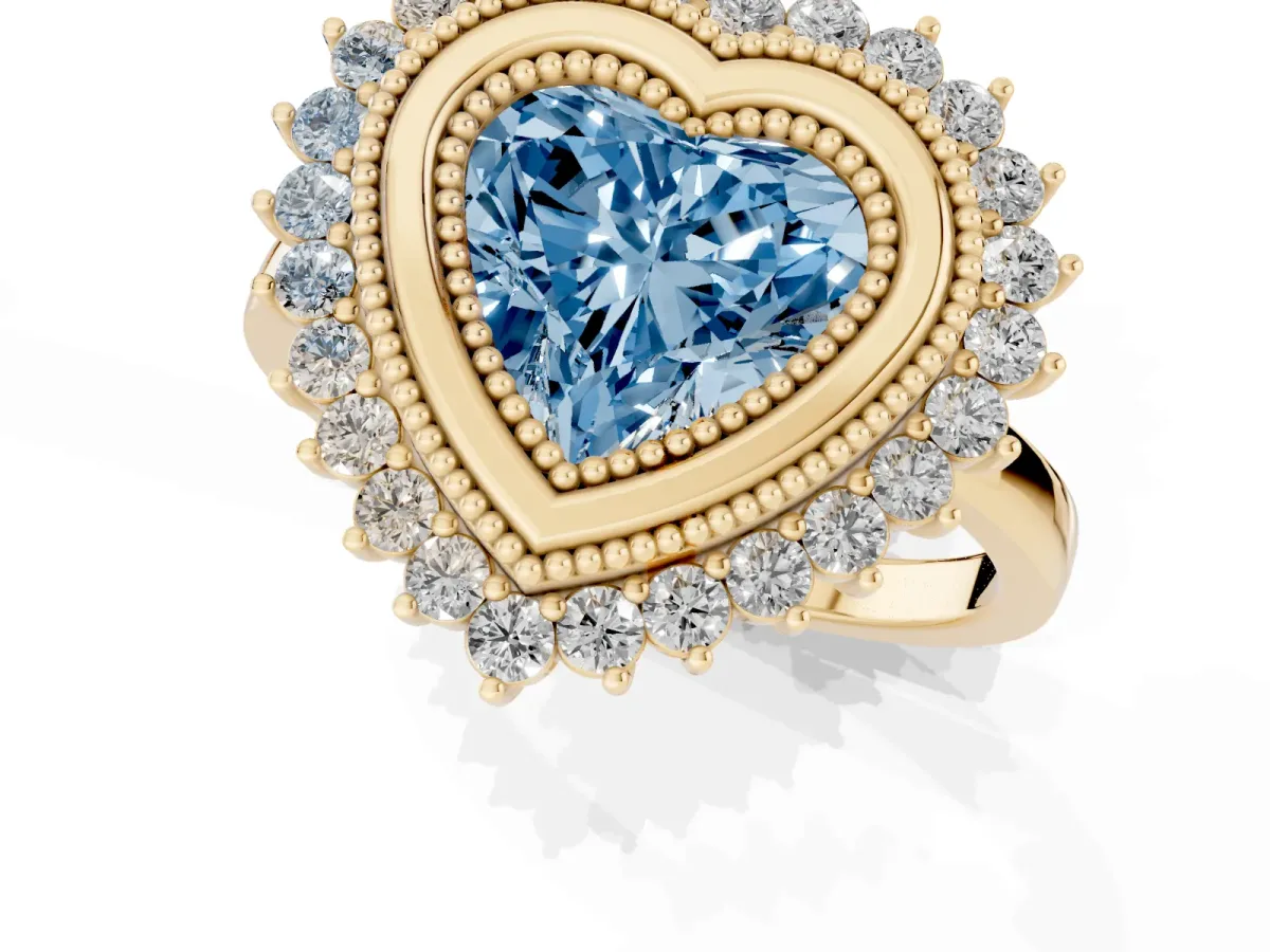 Fancy Blue Heart Cut Halo Diamond Ring with Milgrain Edge and Round Prong Setting Yellow gold