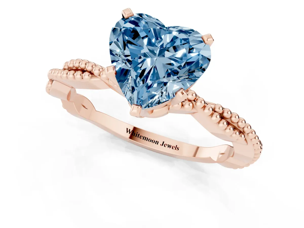 Fancy Blue Heart Cut Solitaire Twisted Band with Bead Prong Setting Rose gold