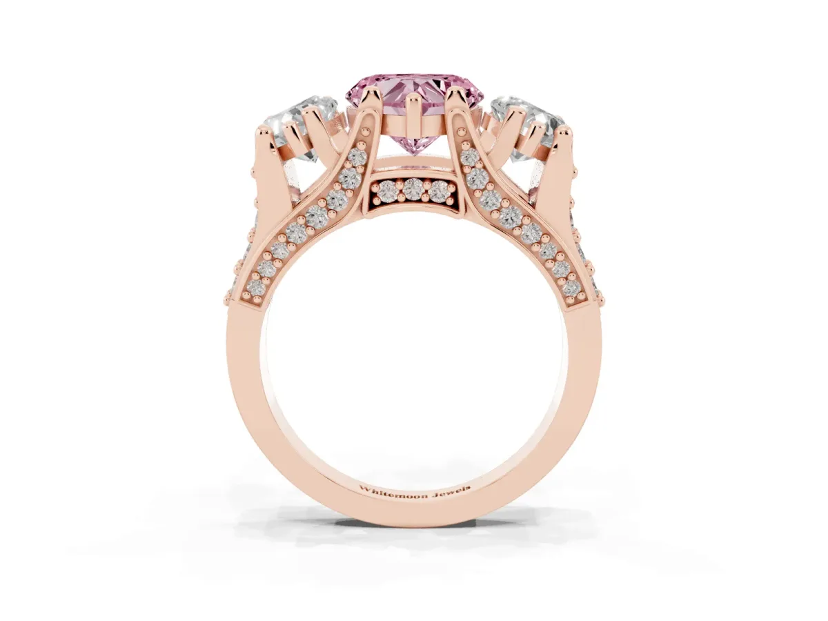 Fancy Pink Heart Cut Diamond Three-Stone Ring with Channel Set Band and Four-Prong Setting Rose gold