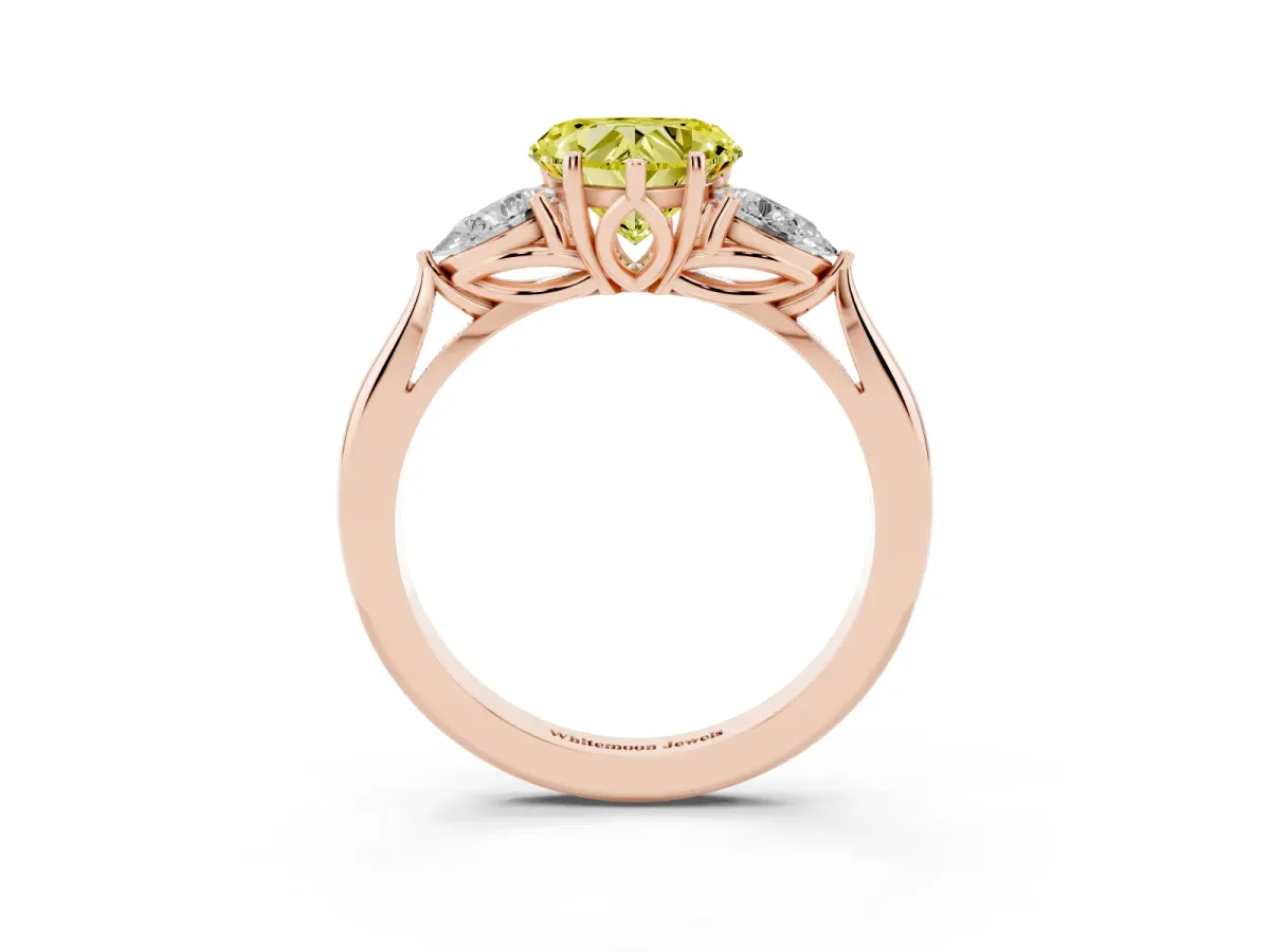 Fancy Yellow Three-Stone Heart Cut Diamond Ring with Pear Side Stones in Four-Prong Setting Rose gold
