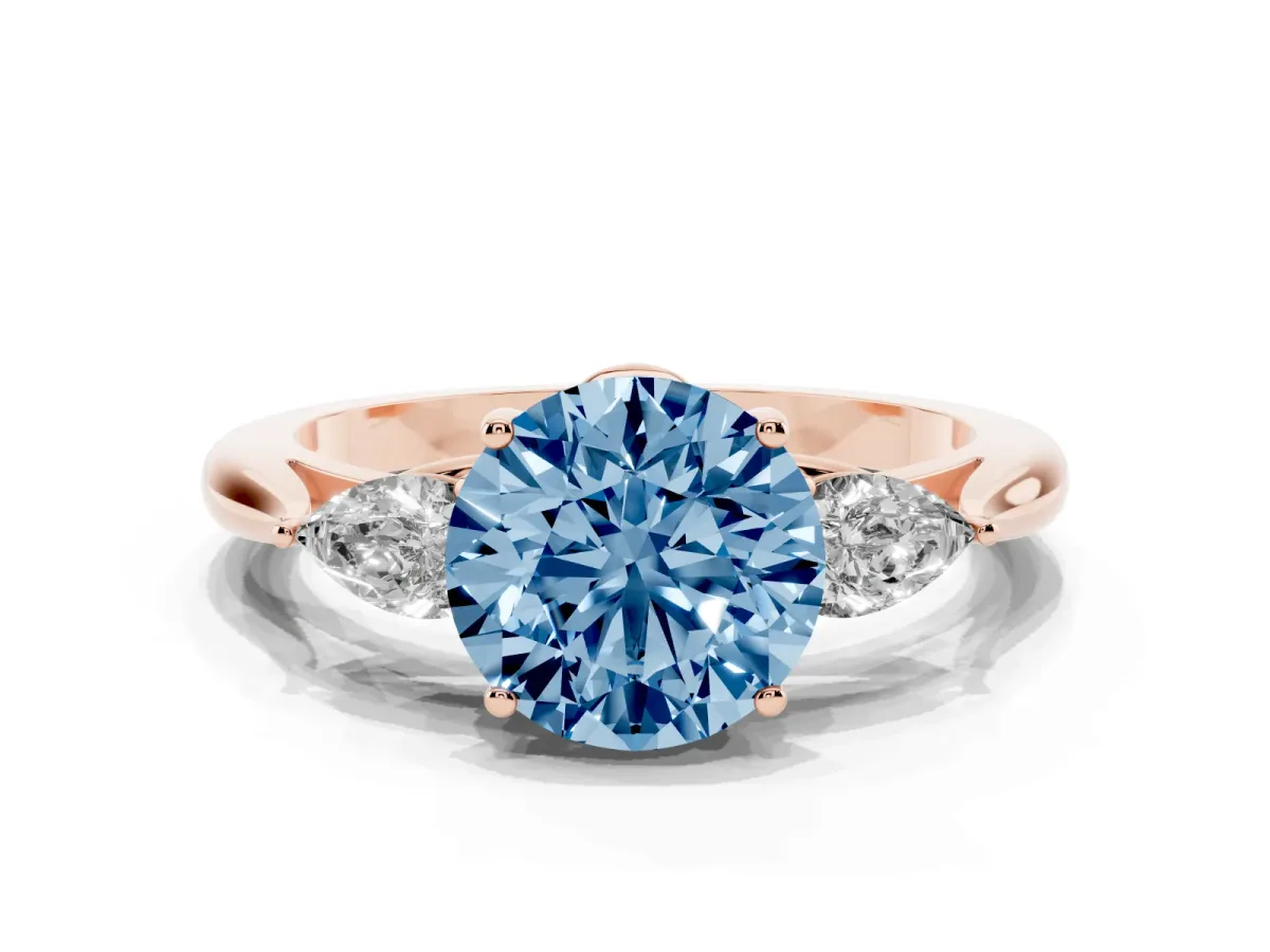 Fancy Blue Round Cut Diamond Three-Stone Ring with Pear Side Stones and Prong Setting Rose gold
