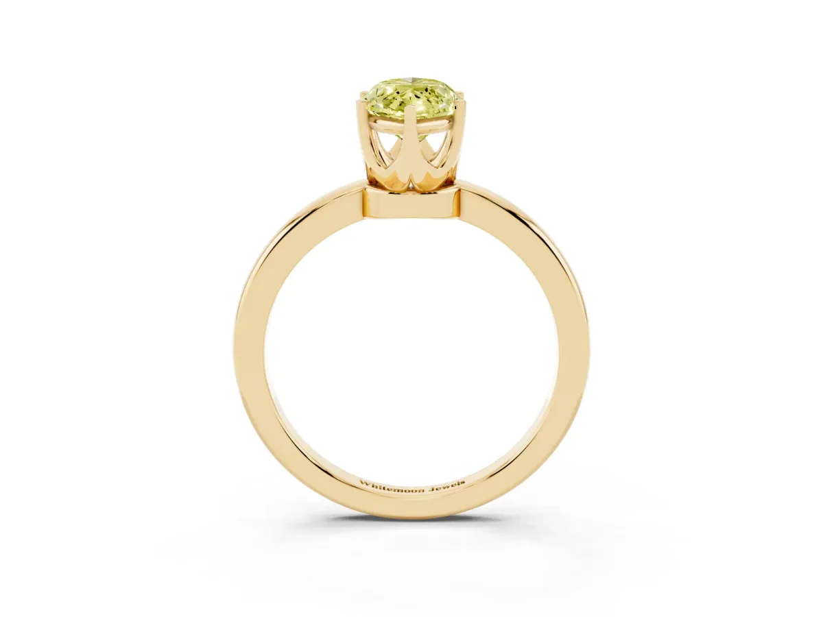 Fancy Yellow Marquise Cut Solitaire Diamond Ring with Six-Prong Setting on a Classic Band Yellow gold