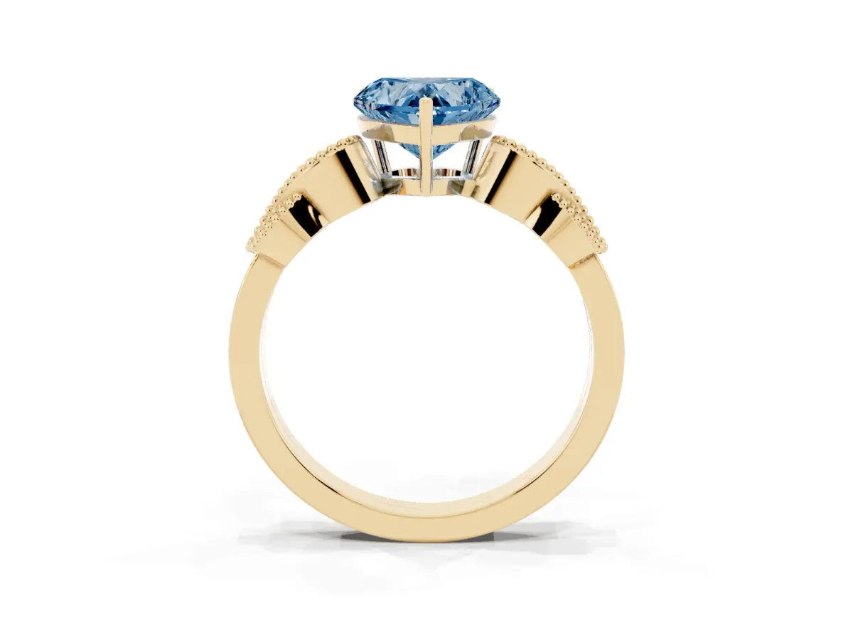 Fancy Blue Heart Cut Solitaire Milgrain Leaf Band with Prong Setting Yellow gold