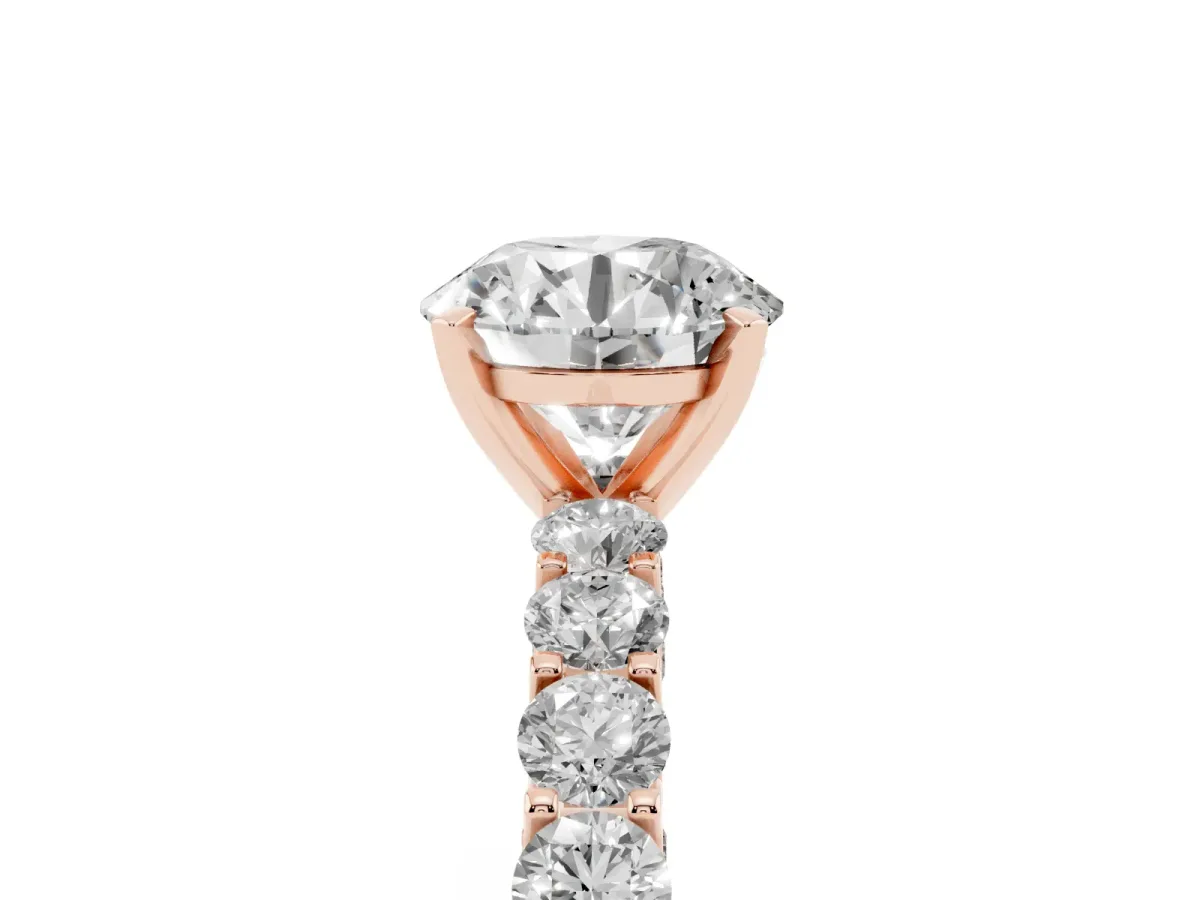 Round Cut Diamond Solitaire Ring with Shared Prong Pavé Band and Four-Prong Setting Rose gold