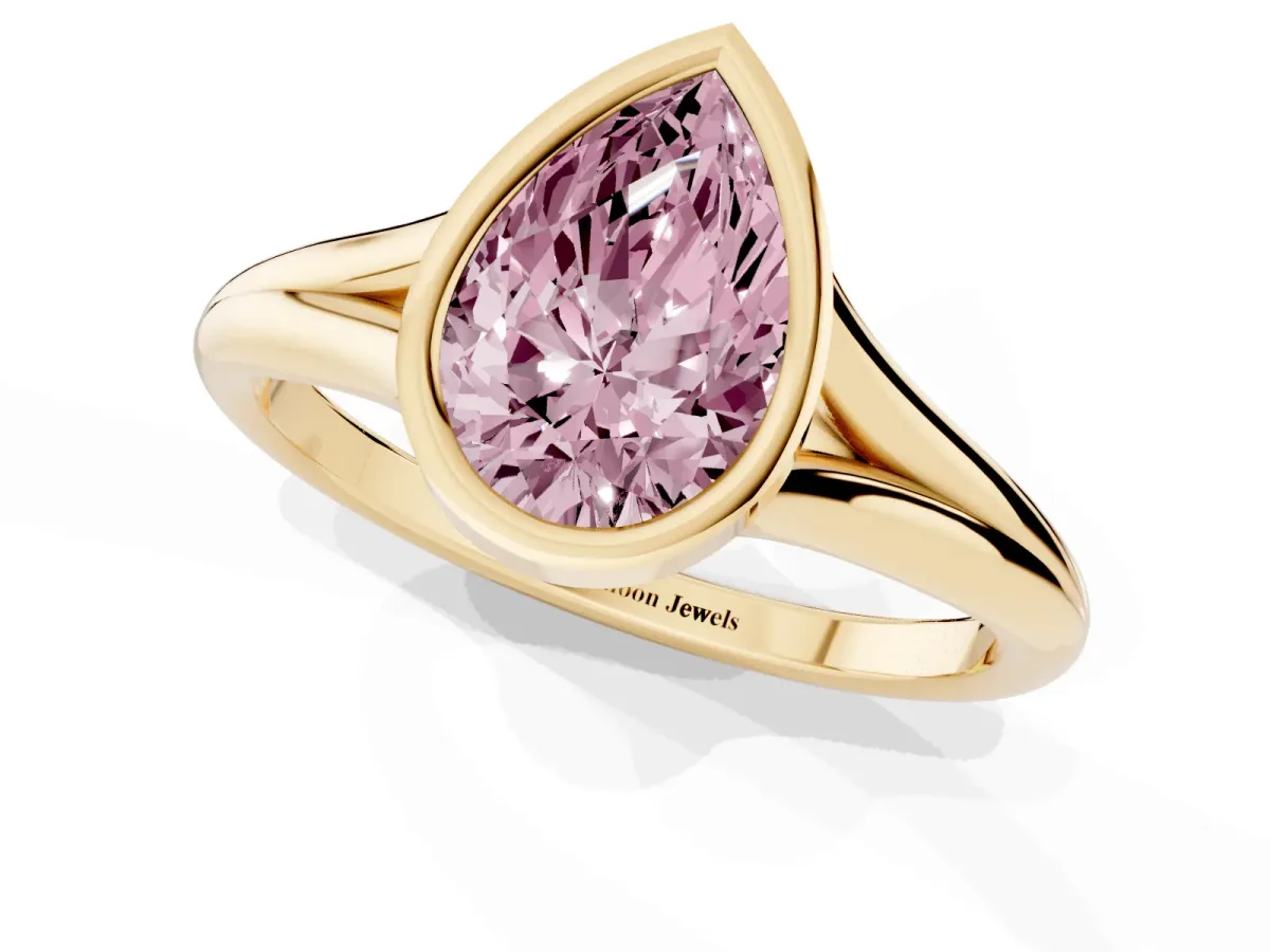 Fancy Pink Bezel Set Pear Cut Cut Solitaire Ring with Tapered Band Yellow gold