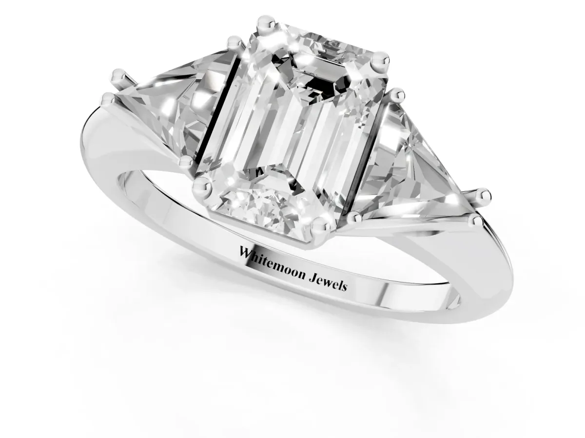 Three-Stone Emerald Cut Diamond Engagement Ring with Trillion Side Stones and Prong Setting Silver