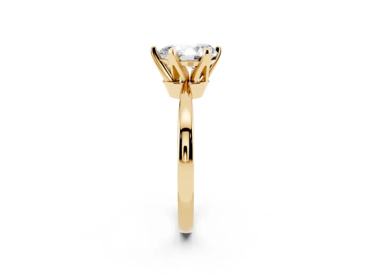 Pear Cut Solitaire Engagement Ring with Six-Prong Setting and Tapered Band Yellow gold