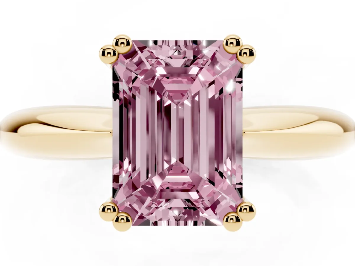 Fancy Pink Emerald Cut Cut Solitaire Engagement Ring with Tapered Band and Four-Prong Setting Yellow gold
