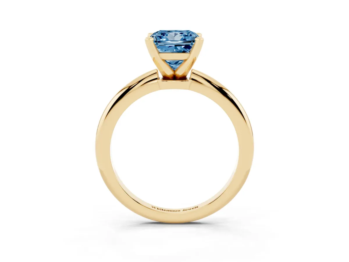 Fancy Blue Princess Cut Diamond Solitaire Ring with Prong Setting and Classic Band Yellow gold