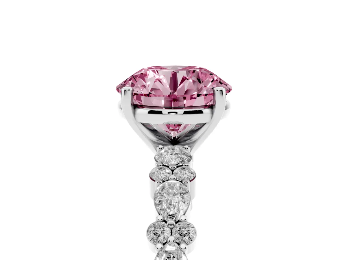 Fancy Pink Round Cut Diamond Side Stone Solitaire Ring with Round and Four-Prong Setting Platinum