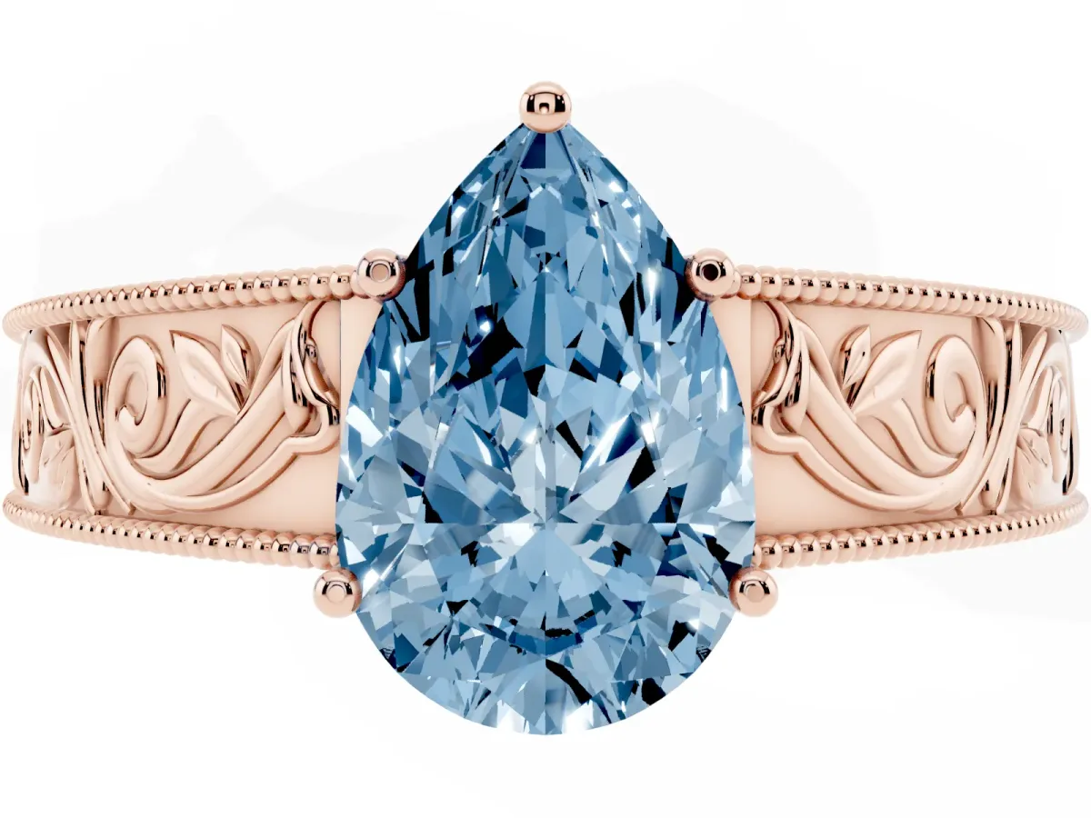 Fancy Blue Pear Cut Diamond Solitaire Ring with Engraved Band and Four-Prong Setting Rose gold