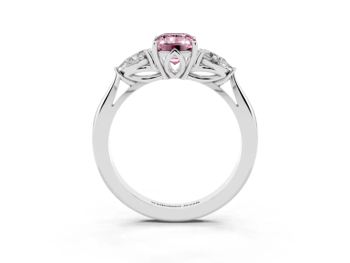 Fancy Pink Three-Stone Emerald Cut Diamond Ring with Pear Side Stones in Four-Prong Setting Platinum
