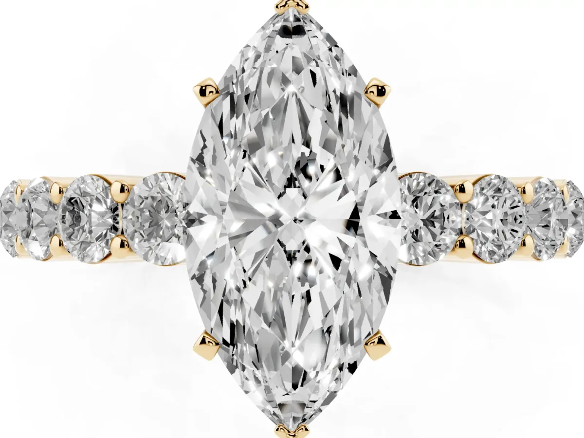 Marquise Cut Diamond Solitaire Ring with Shared Prong Round Side Stones Yellow gold