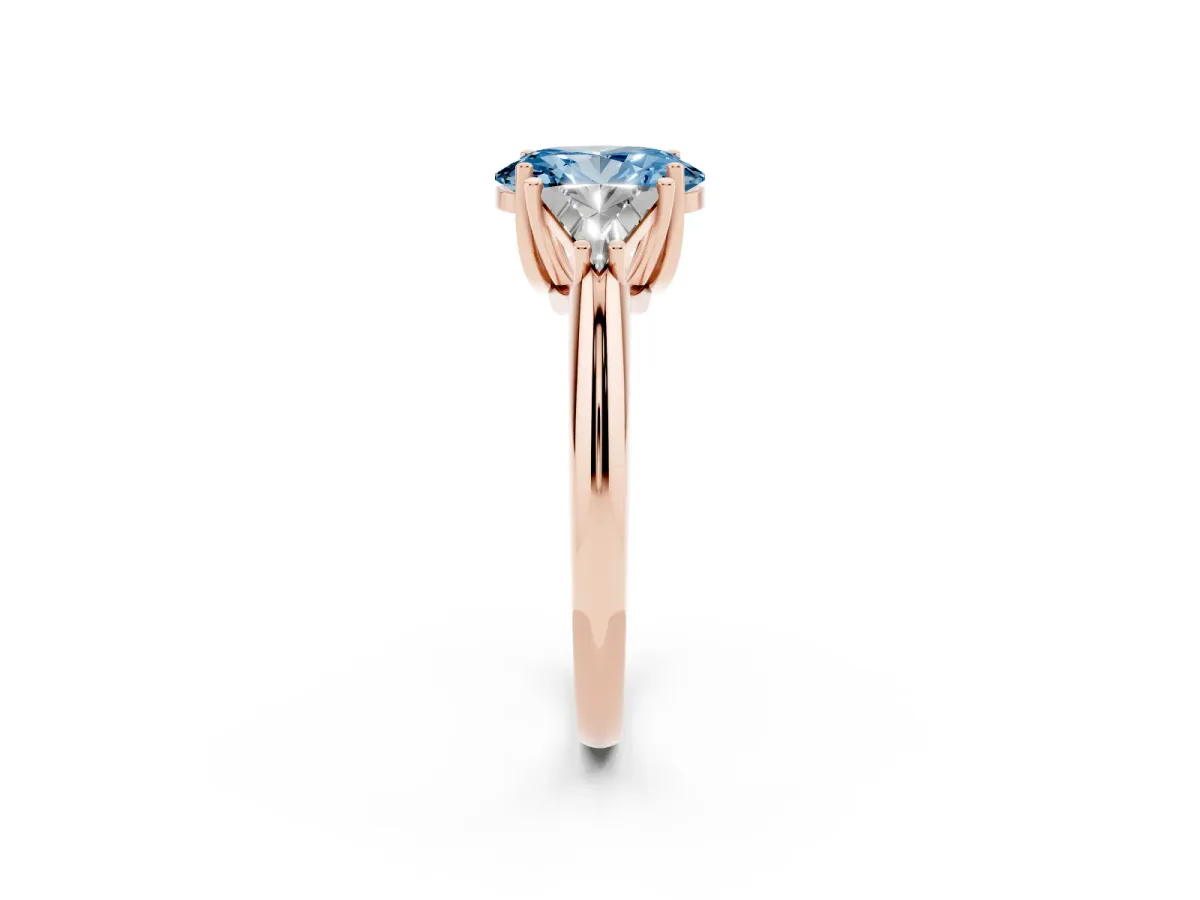Fancy Blue Three-Stone Oval Cut Diamond Engagement Ring with Trillion Side Stones and Prong Setting Rose gold