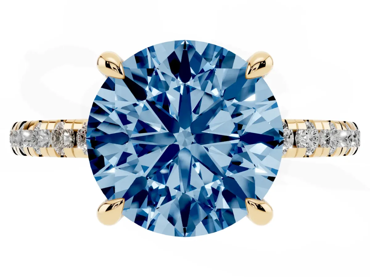 Fancy Blue Round Cut Diamond Brilliant Solitaire Ring with Pavé Band and Four-Prong Setting Yellow gold