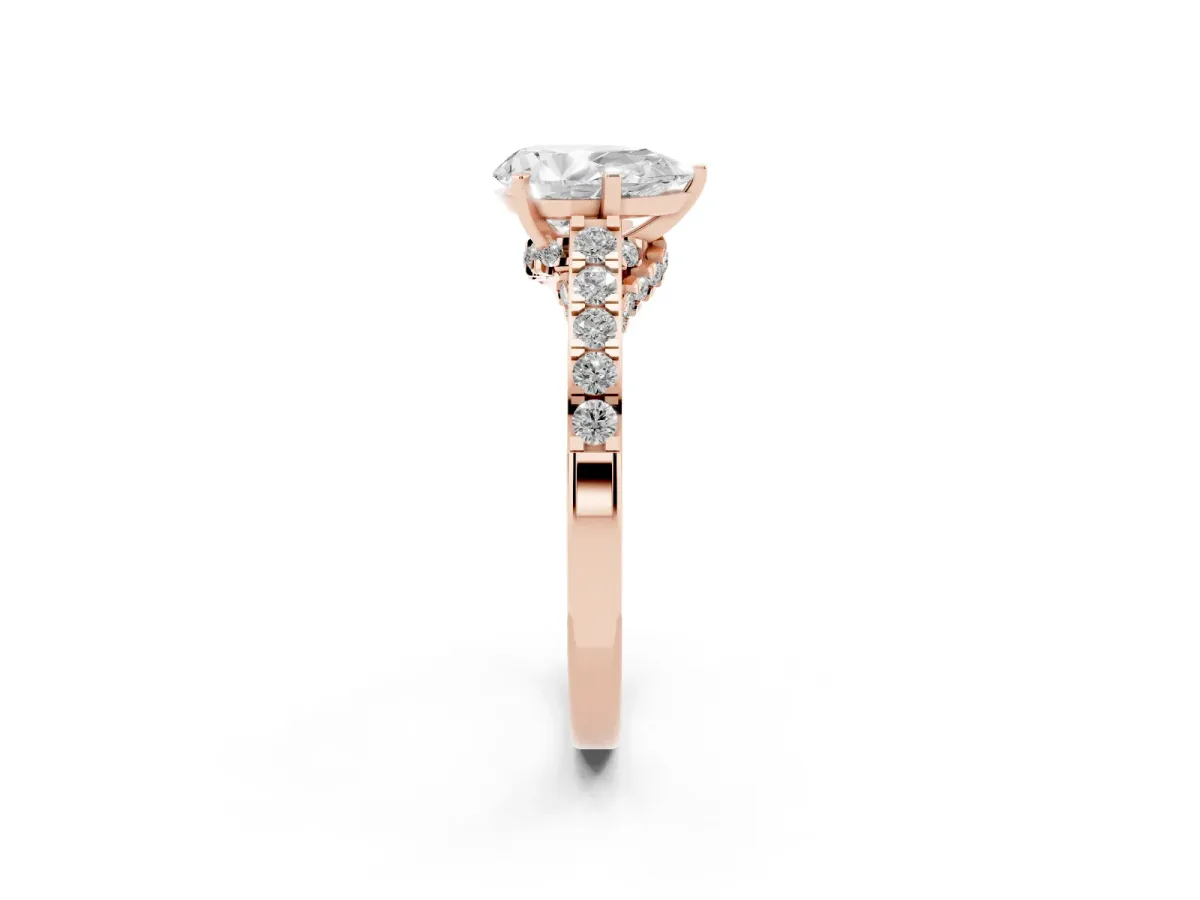 Pear Cut Diamond Solitaire Ring with Crossover Gallery and Round Pavé Band Rose gold