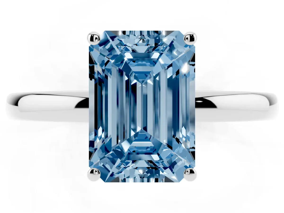 Fancy Blue Emerald Cut Solitaire Diamond Ring with Prong Setting and Plain Band Silver