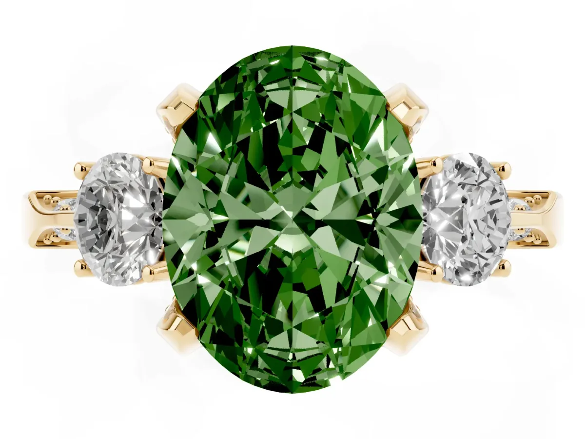 Fancy Green Oval Cut Brilliant Three-Stone Diamond Ring with Pavé Band and Four-Prong Setting Yellow gold