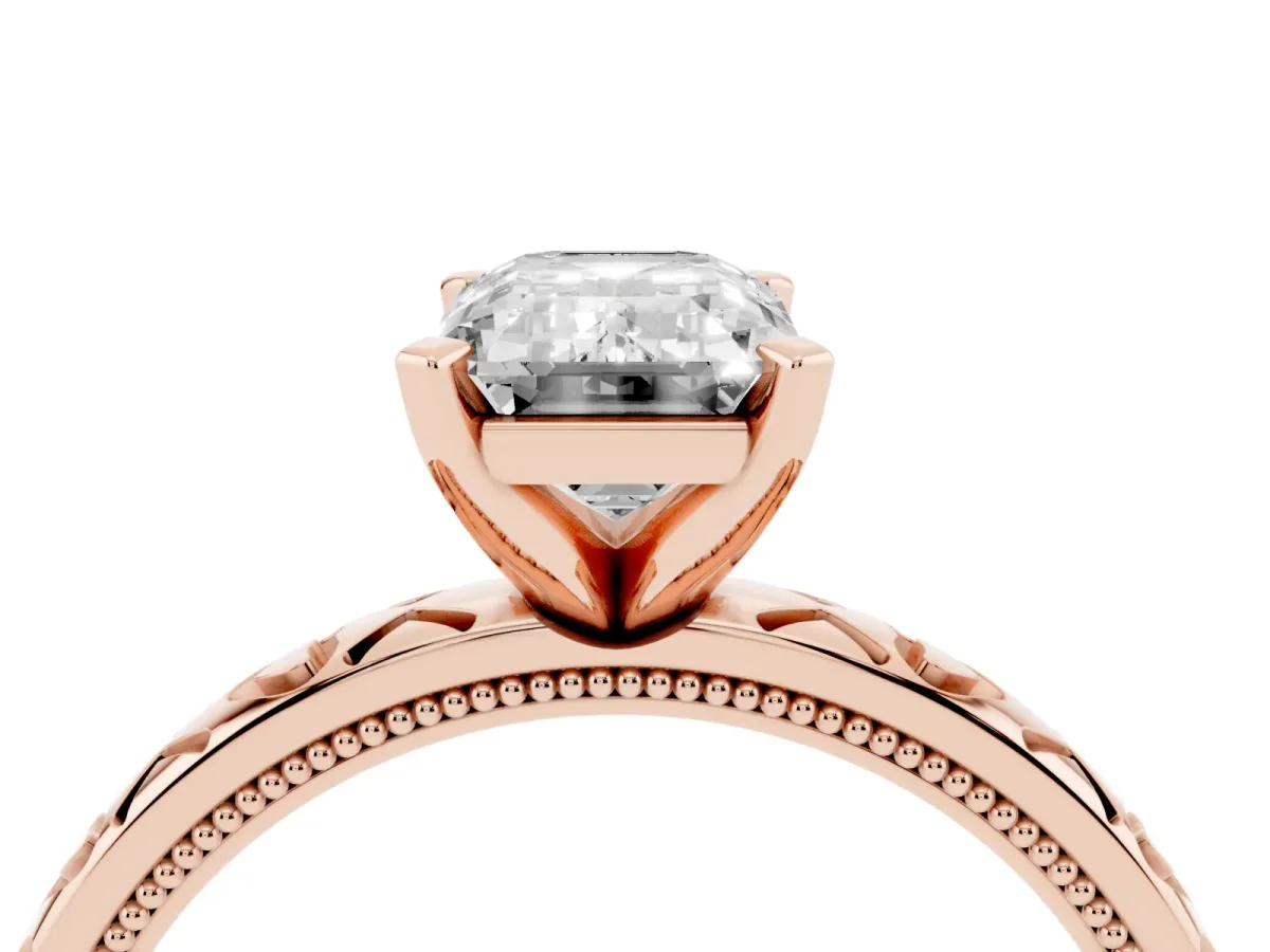 Emerald Cut Solitaire Diamond Engagement Ring with XO Engraved Band and Four-Prong Setting Rose gold