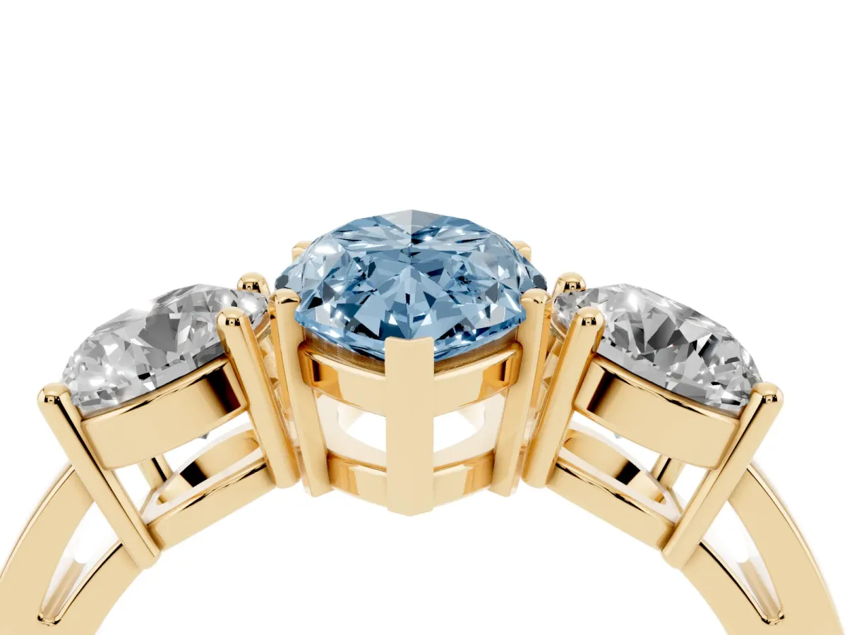 Fancy Blue Three-Stone Marquise Cut Diamond Ring with Round Side Stones, Classic Band, and Four-Prong Setting Yellow gold
