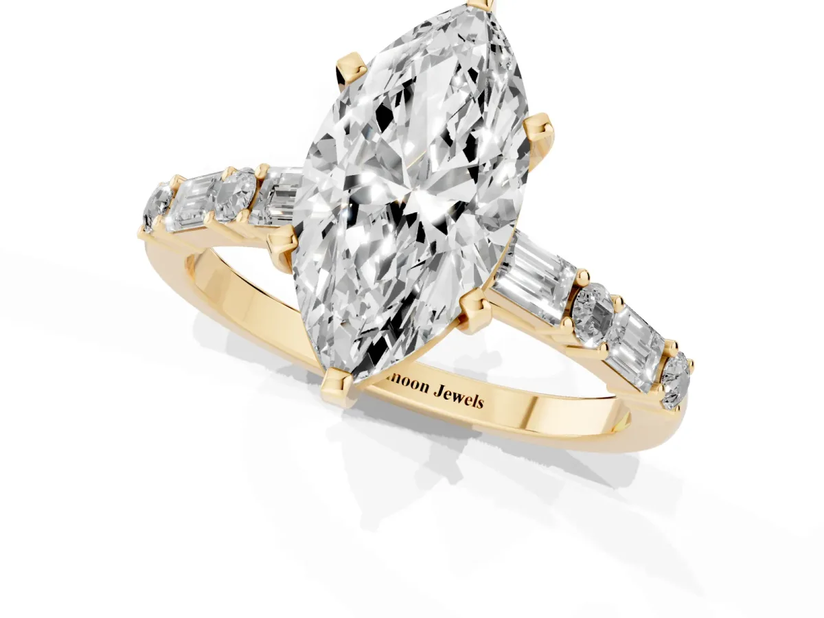 Marquise Cut Diamond Solitaire with Side Baguettes and Channel Set Band Yellow gold