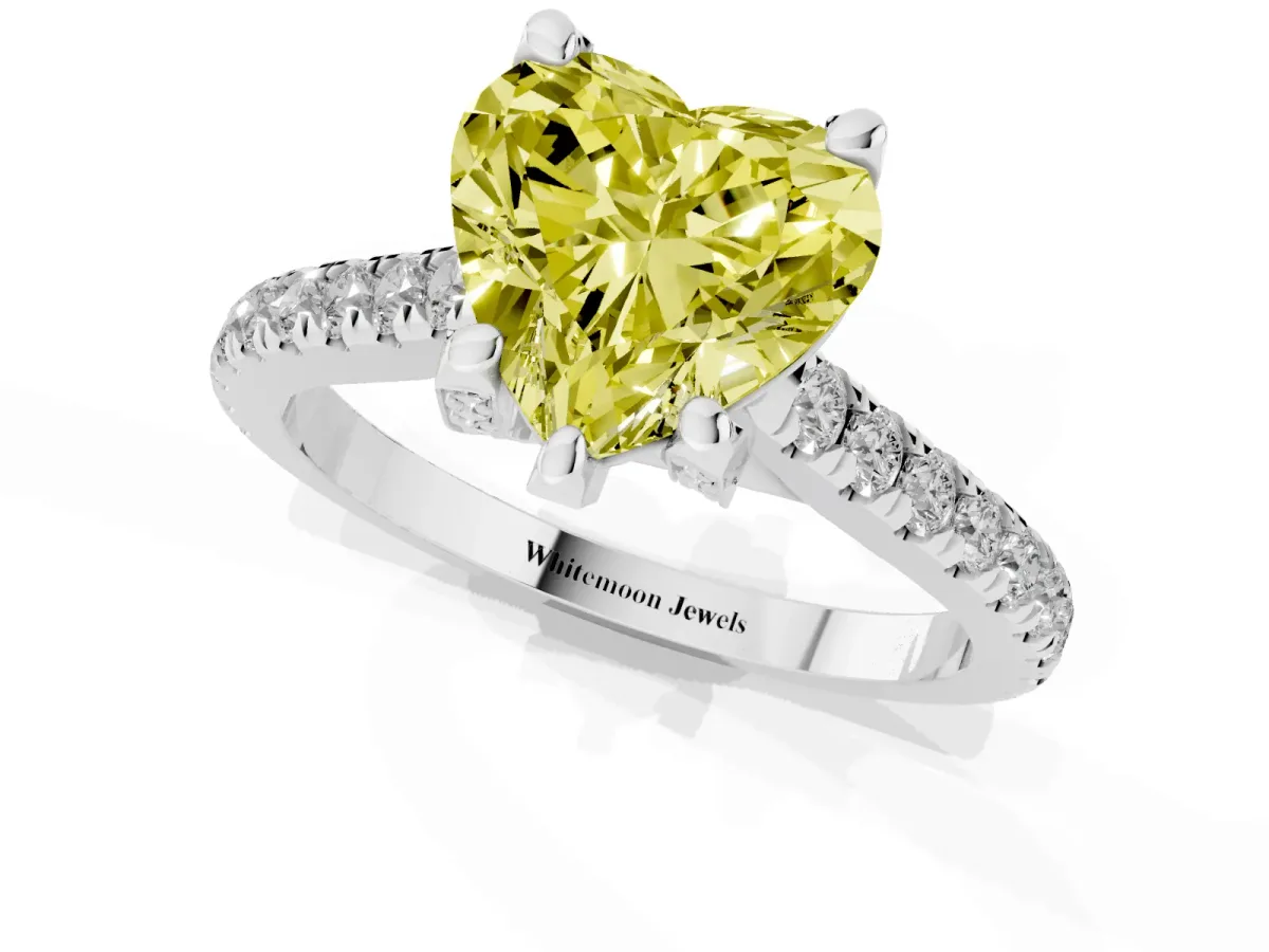 Fancy Yellow Heart Cut Brilliant Diamond Solitaire with Pavé Band and Four-Prong Setting Silver