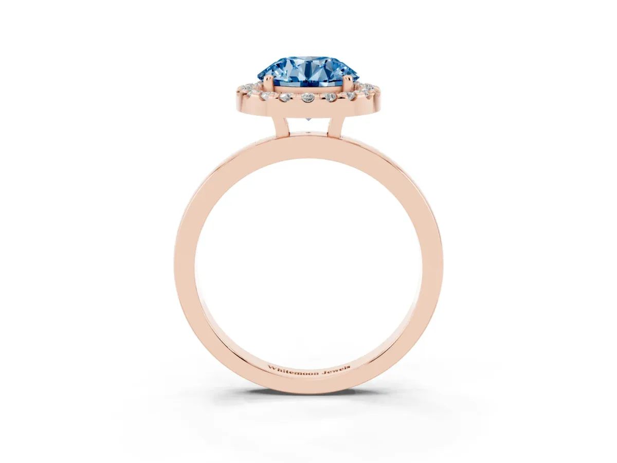 Fancy Blue Round Cut Halo Diamond Solitaire with Pavé Band and Four-Prong Setting Rose gold