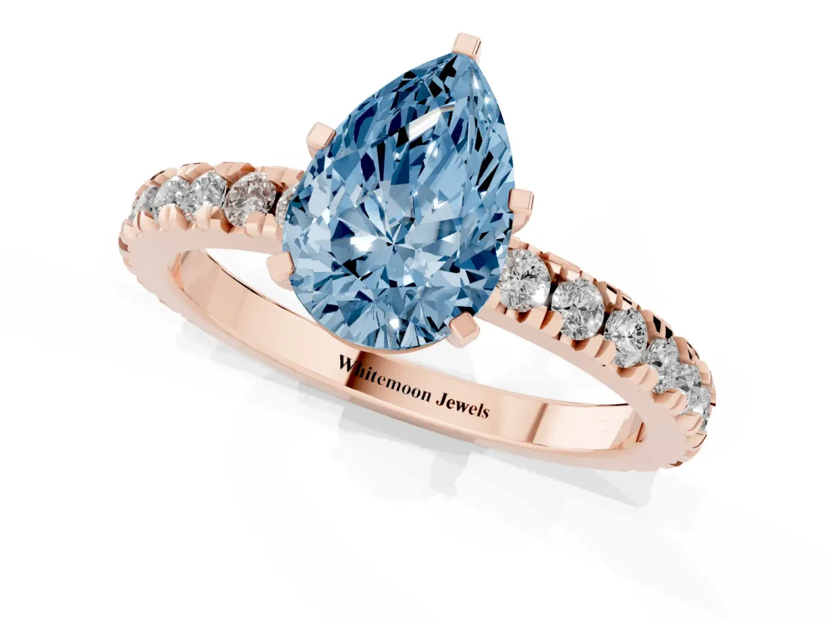 Fancy Blue Pear Cut Diamond Pavé Band Solitaire with Four-Prong Setting Rose gold