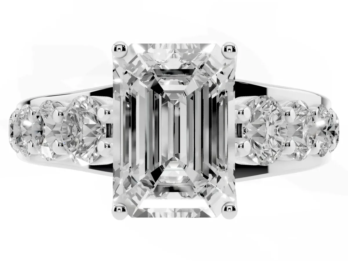 Emerald Cut Diamond Engagement Ring with Pavé Band and Four-Prong Setting Silver