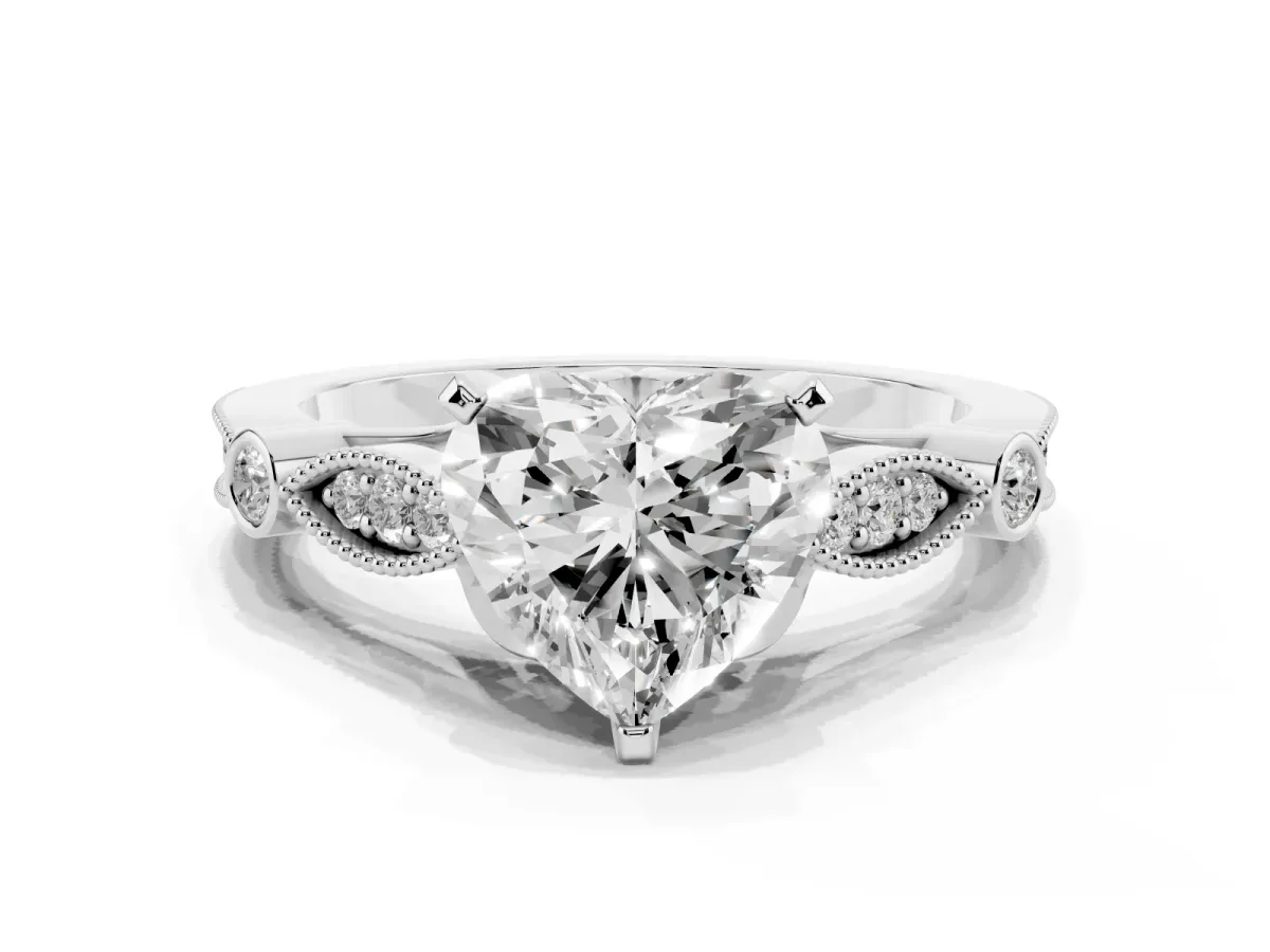 Heart Cut Cut Diamond with Milgrain Marquise and Bezel Accents on a Solitaire Band with Prong Setting Platinum