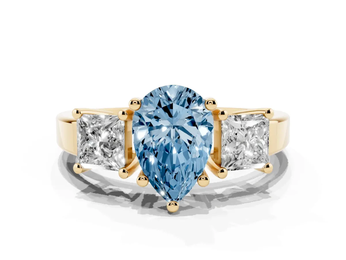 Fancy Blue Three-Stone Pear Cut Cut Solitaire Ring with Prong Setting Yellow gold