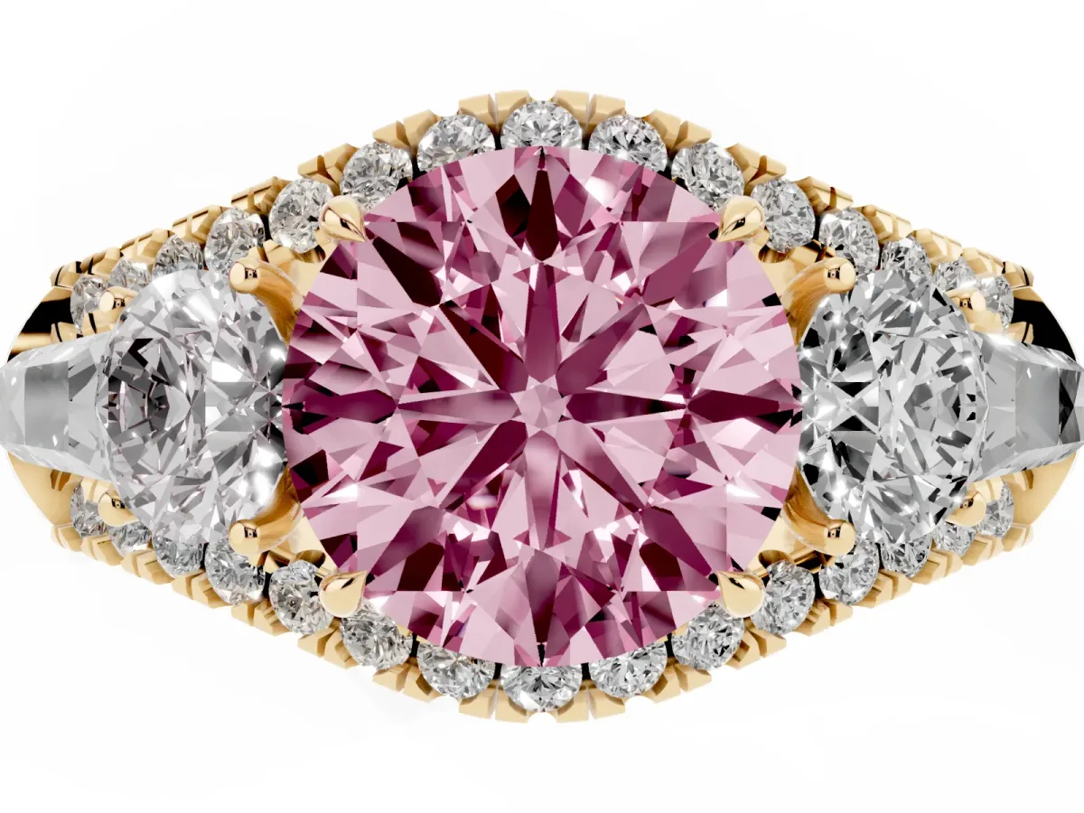 Fancy Pink Three-Stone Round Cut Diamond Engagement Ring with Pave Band and Prong Setting Yellow gold