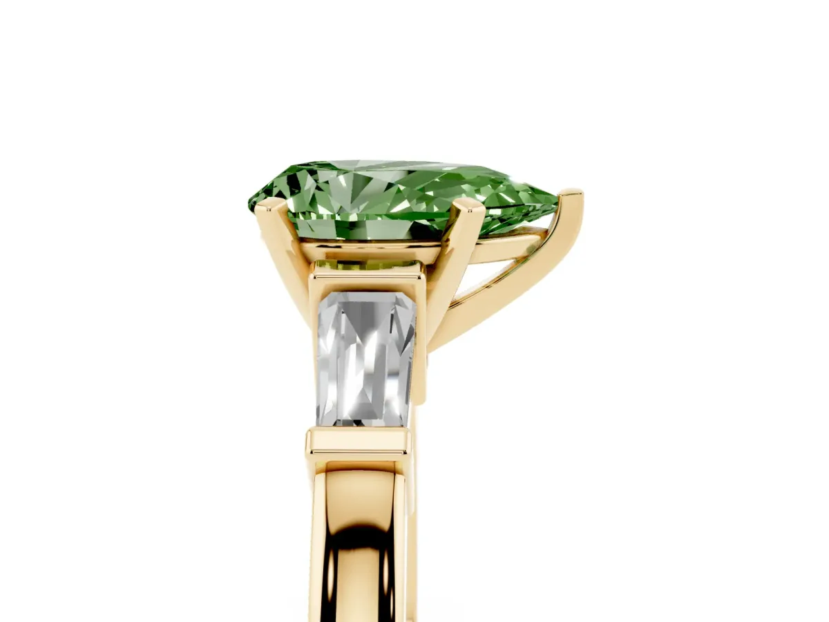 Fancy Green Pear Cut Cut Diamond Solitaire Ring with Tapered Baguette Accents and Four-Prong Setting Yellow gold